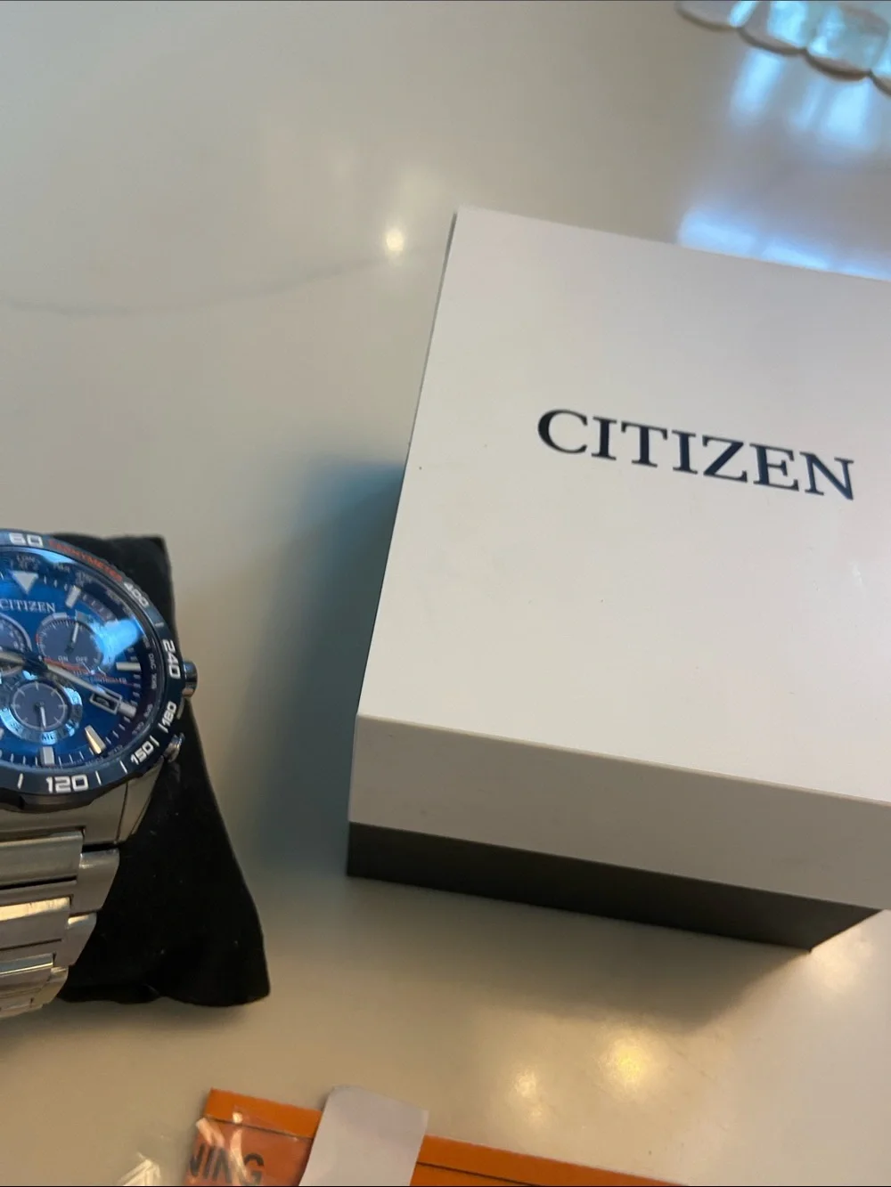 Citizen Eco-Drive Stainless Watch with Blue Dial and Silver Bracelet.. sapphire